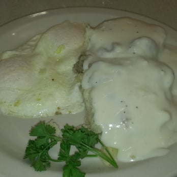 Jim's Restaurants - Pioneer breakfast: 1 pioneer biscuit smothered in white gravy with sausage chunks and two eggs over easy $4.99. - American Near Me - San Antonio, Texas Jim's Restaurants - Pioneer breakfast: 1 pioneer biscuit smothered in white gravy with sausage chunks and two eggs over easy $4.99. - American Near Me - San Antonio, Texas