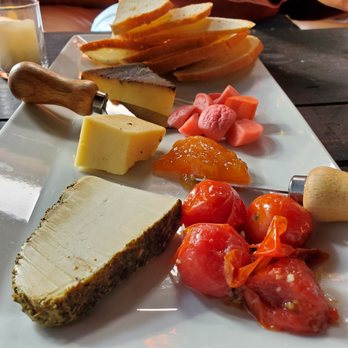 Winnie’s Wine Bar - Cheese Board: Goat Cheese, White Cheddar and Smoked Gouda - Wine Bars Near Me - St. Louis, Missouri Winnie’s Wine Bar - Cheese Board: Goat Cheese, White Cheddar and Smoked Gouda - Wine Bars Near Me - St. Louis, Missouri