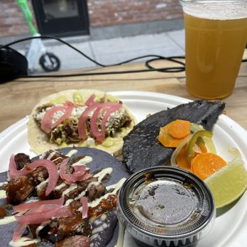 Delylah's Tacos - a plate of tacos and a drink - Food Trucks Near Me Delylah's Tacos - a plate of tacos and a drink - Food Trucks Near Me