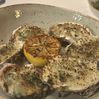 Curean - Oysters Rockefeller 7/10 too creamy for my taste and texture pallet but still tasty. - Mediterranean Near Me - Greenville, South Carolina