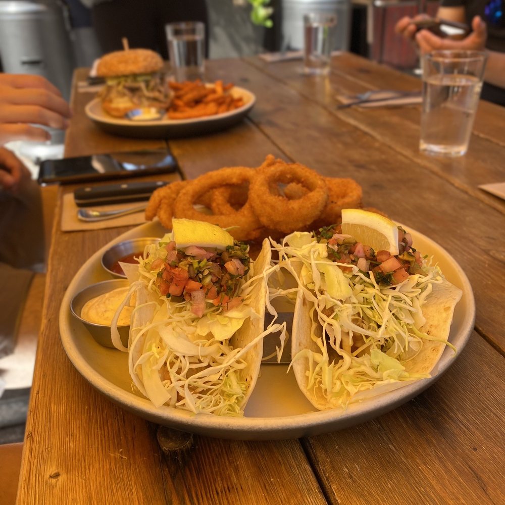 LOCAL Public Eatery Lansdowne - Tacos and side of onion rings - Burgers Near Me - Ottawa, Ontario LOCAL Public Eatery Lansdowne - Tacos and side of onion rings - Burgers Near Me - Ottawa, Ontario