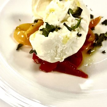 Fiorella Italian Restaurant - Appetizer Burrata with roasted red and yellow peppers - Italian Near Me - Sarasota, Florida Fiorella Italian Restaurant - Appetizer Burrata with roasted red and yellow peppers - Italian Near Me - Sarasota, Florida