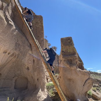 Puye Cliff Dwellings - Climbing down from the mesa - Tours Near Me - Espanola, New Mexico Puye Cliff Dwellings - Climbing down from the mesa - Tours Near Me - Espanola, New Mexico