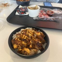 Chicken bowl with wanna garlic Serrano and boom boom sauce