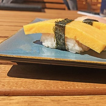 Sushi Raku - Tamago Nigiri: Slightly sweet custard-like egg omelette - Sushi Bars Near Me - Saskatoon, Saskatchewan
