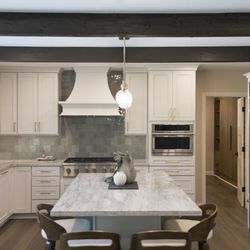 This kitchen features elevated HanStone Matterhorn Quartz countertops.