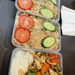 Mod Thai Food & Noodle Bar - Pad Kapow chicken with steamed rice, and fried rice with chicken and shrimp