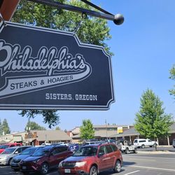 Philadelphia Steaks & Hoagies - Sign out front, looking over the town