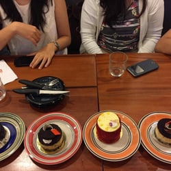 Orange Whisk Restaurant and Patisserie - Almost too cute to eat. L to R: chocolate truffle, oreo cheesecake, red velvet, and oreo cheesecake again.