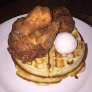 Photo of Haute Dish - Minneapolis, MN, United States. Chicken and waffle with a side of bacon ice cream and syrup with bacon bits