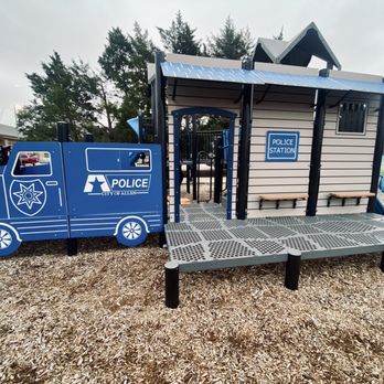 Green Park - View of one side of the smaller playground (police station theme) - Parks Near Me - Allen, Texas
