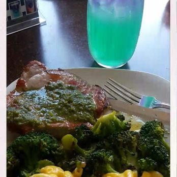 The Upper Room Kitchen - Specialty drink: pixi dust Dish: pork chop with pesto sauce, steamed broccoli, and mac & cheese - Salad Near Me - Tracy, California The Upper Room Kitchen - Specialty drink: pixi dust Dish: pork chop with pesto sauce, steamed broccoli, and mac & cheese - Salad Near Me - Tracy, California