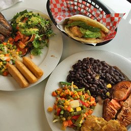 King fish + sides, salmon + sides, shrimps & avocado arepa King fish + sides, salmon + sides, shrimps & avocado arepa