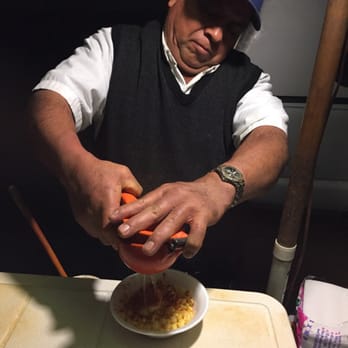 Corn Man - Adding fresh lemon juice! - Food Stands Near Me - Los Angeles, California