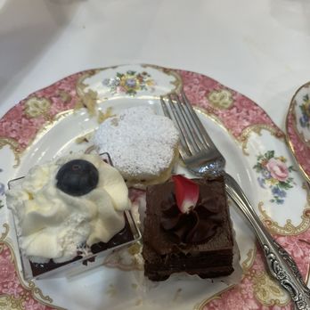 Marlene's Tea & Cakes - Desserts clockwise: Shortbread cookie with cream filling, decadent chocolate petit four, petit custard parfait - Coffee & Tea Near Me - San Diego, California