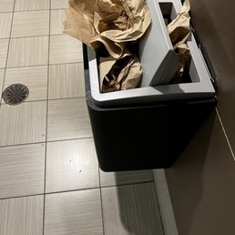 Overflowing trash cans, empty spray bottles for cleaning equipment, no tissue in the restrooms, no sit covers, Overflowing trash cans, empty spray bottles for cleaning equipment, no tissue in the restrooms, no sit covers,