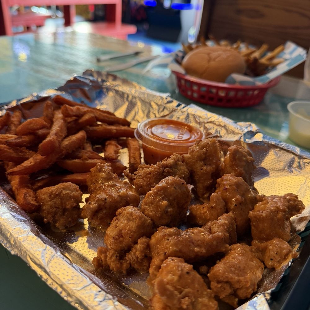 The Dive Food & Spirits - Tossed bones less chicken and sweet potato fries ! - American Near Me - Carolina Beach, North Carolina The Dive Food & Spirits - Tossed bones less chicken and sweet potato fries ! - American Near Me - Carolina Beach, North Carolina
