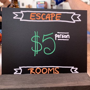 Class Axe Throwing - Take a shot at one of three Escape Rooms! - Axe Throwing Near Me - Jacksonville, Florida