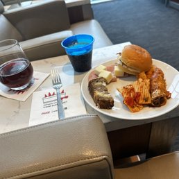 This location has much better food and service ( shockingly ) than the Houston lounges I've been in.