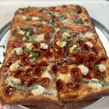 Smash And Slice - Grandmas Pizza: 1/2 & 1/2 Tony's Way & Vodka Chicken Parm featuring provolone - Pizza Near Me - Las Vegas, Nevada
