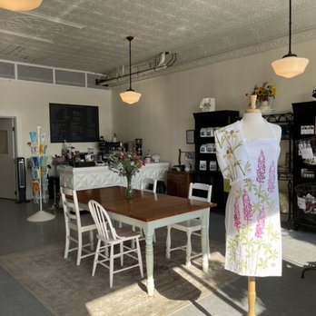 Narrow Escape - a room with a table, chairs, and a mannequin - Coffee & Tea Near Me - Lubec, Maine