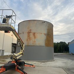 Hammer's Mobile Blasting - 24' water tower in process of stripping.