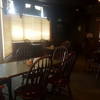 The English Pub - The tables. Nice dark atmosphere. - Pubs Near Me - Ravenna, Ohio