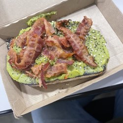 Dunkin' - Avocado toast topped with bacon
