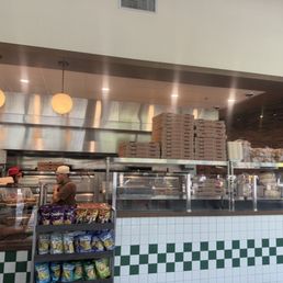 As you walk in the pizza is premade and they heat it up to order. As you walk in the pizza is premade and they heat it up to order.