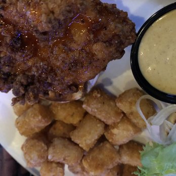 Hickory Tavern - Close up of the Chicken Sandwich "Your Way", check out that sauce! - Sports Bars Near Me - Columbia, South Carolina Hickory Tavern - Close up of the Chicken Sandwich "Your Way", check out that sauce! - Sports Bars Near Me - Columbia, South Carolina