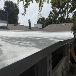 The completed, nicely painted patio roof.