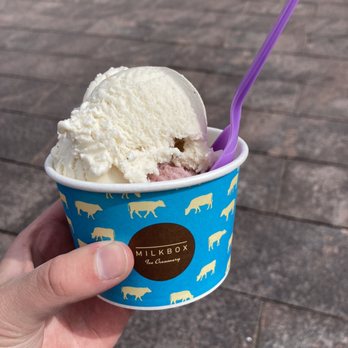 Milkbox Ice Creamery - a hand holding a cup of ice cream - Ice Cream & Frozen Yogurt Near Me - Denver, Colorado