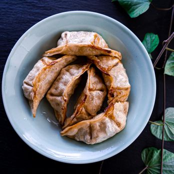 Hana Grill - a bowl of dumplings on a table - Japanese Near Me - Sherman Oaks, California Hana Grill - a bowl of dumplings on a table - Japanese Near Me - Sherman Oaks, California