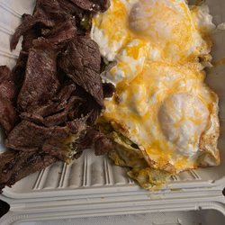 Tacos El Nino Santana - Chilaquiles verdes, eggs, carne asada