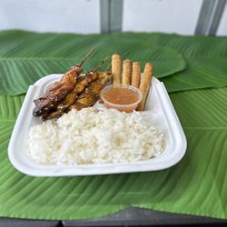 Golden Sun Filipino Cuisine - Rice, Chicken Skwewers and Lumpia.