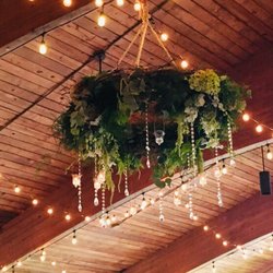 Custom designed and created- breathtaking grapevine wreath w/ fresh floral accents, greenery, hanging votives & crystal!