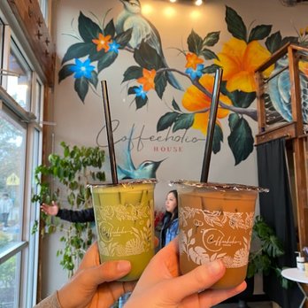 Coffeeholic House - Vegan Vietnamese Latte (front), Iced Matcha Latte (back) - Coffee & Tea Near Me - Seattle, Washington Coffeeholic House - Vegan Vietnamese Latte (front), Iced Matcha Latte (back) - Coffee & Tea Near Me - Seattle, Washington
