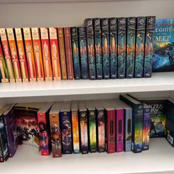 Walls of Books - Took this pic of the Percy Jackson section for my daughter. Well stocked!