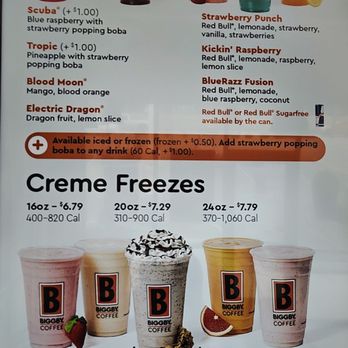 Biggby Coffee - Menu 2/20/2026 - The menu lists various beverages including energy drinks like Biggby Blast in multiple sizes, with calorie information, and Red Bull Mocktails with flavors such as Strawberry Punch and Kickin' Raspberry. It also offers creme freezes in different sizes, including Red Bull, Banana Berry, and Chocolate Chip Cookie, with calorie details. Additional options include strawberry popping boba and plant-based energy boosts. The menu emphasizes customization with options for ice or frozen drinks and mentions calorie counts and ingredients. - Coffee & Tea Near Me - Itasca, Illinois
