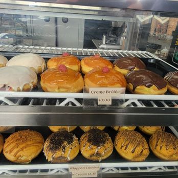 Waddup Dough - Some of their donuts display. I recommend the creme brulee. - Desserts Near Me - Saint Anthony, Minnesota Waddup Dough - Some of their donuts display. I recommend the creme brulee. - Desserts Near Me - Saint Anthony, Minnesota