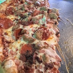 Time Out Sports Grill - Half of a meat lovers pizza lol so good!