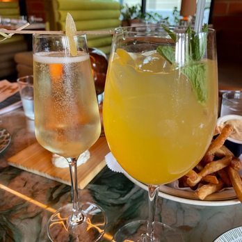 Lee's - Left : CHAMPAGNE COCKTAIL, Right : Passionfruit Spritz - Cocktail Bars Near Me - Houston, Texas Lee's - Left : CHAMPAGNE COCKTAIL, Right : Passionfruit Spritz - Cocktail Bars Near Me - Houston, Texas