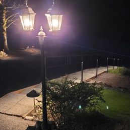 Conversion of plug in lamp to landscape lighting and stair railing lights added to landscape light array. Conversion of plug in lamp to landscape lighting and stair railing lights added to landscape light array.