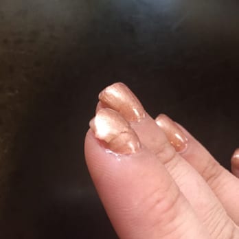 Nail Tek - They painted them an hour ago and it's already pealing off?? Shellac is NOT suppose to do this. Just bad. - Nail Salons Near Me - Portland, Oregon