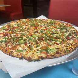 This is the Tikka Masala pizza!! SO good!! Customer service was amazing and pizza came out quick! Super good!!