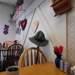 V-day decorations and a boonie hat on a cane tell the tale of most visitors.