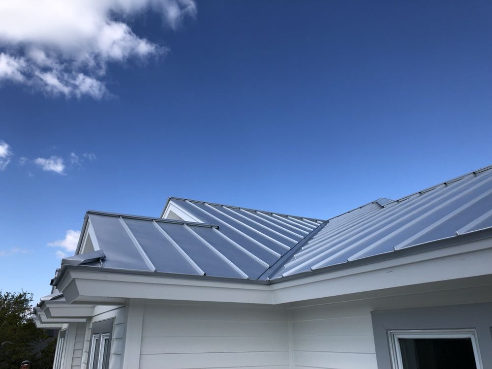 Slide of Canaan roofing and gutters