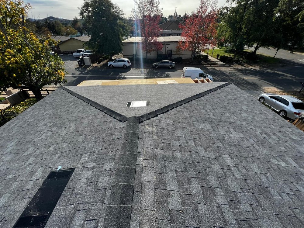 Slide of Queen Roofing