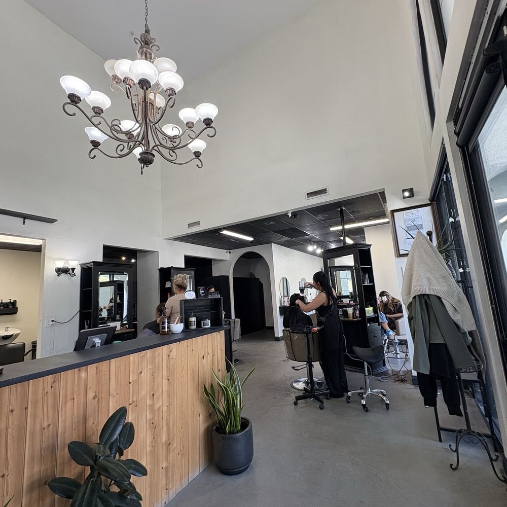 Karina ("hair dresser") with purple highlights in dark hair, in far back . All other employees who also, did not greet :) Karina ("hair dresser") with purple highlights in dark hair, in far back . All other employees who also, did not greet :)