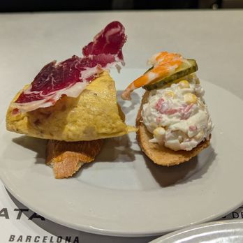 Cerveseria Catalana - Potato omelette with jamon and a seafood salad with a prawn - Spanish Near Me - Barcelona, B